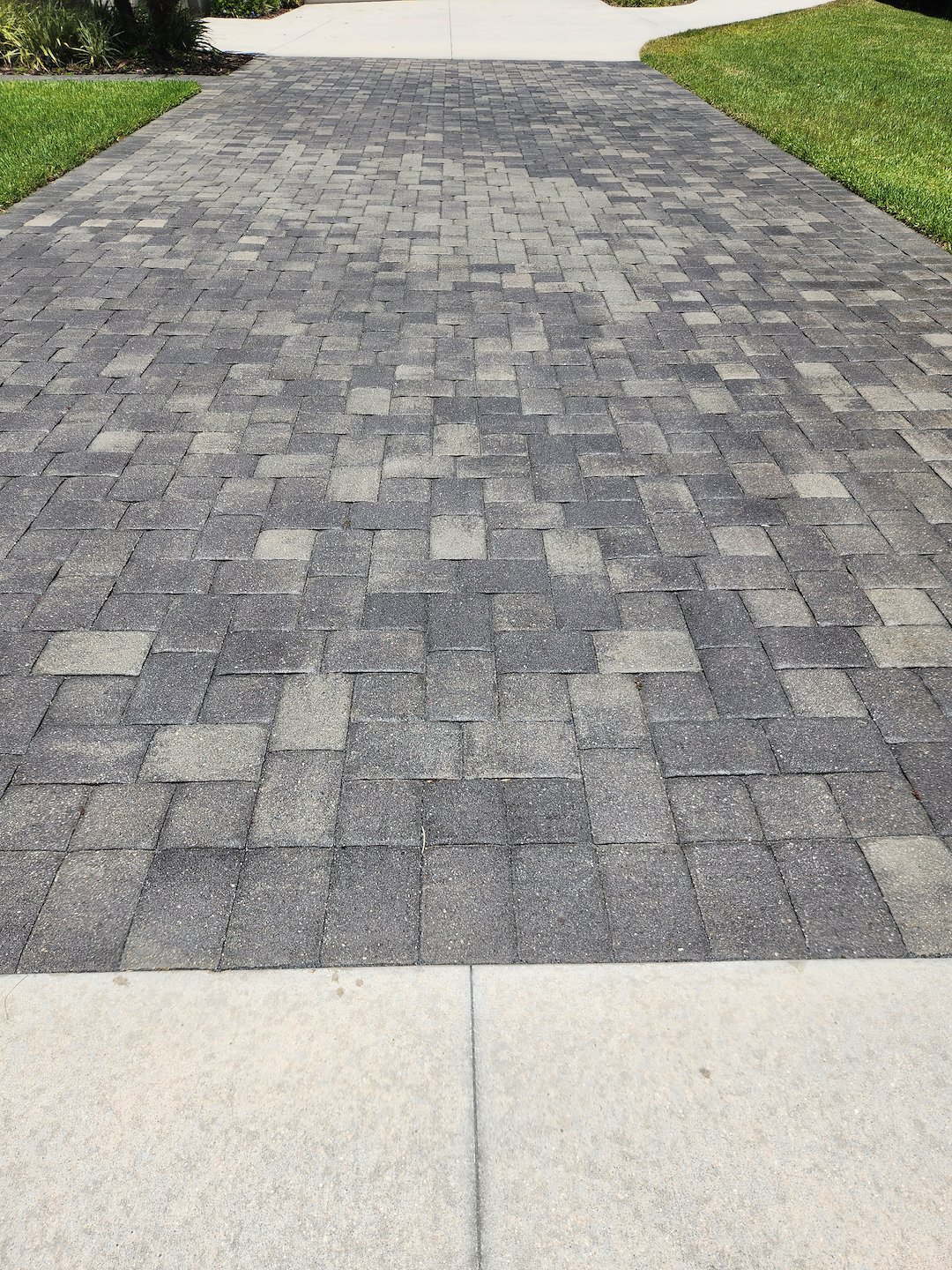 Take a good lock at these dirty pavers in Melbourne, Florida.  This driveway can be sparkling clean with the help of Alpine Home Services.