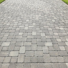 Take-a-good-lock-at-these-dirty-pavers-in-Melbourne-Florida-This-driveway-can-be-sparkling-clean-with-the-help-of-Alpine-Home-Services 0